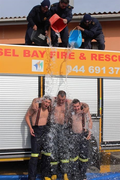 Local firemen take on ice bucket challenge